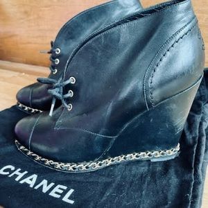 Black Chanel chain link booties